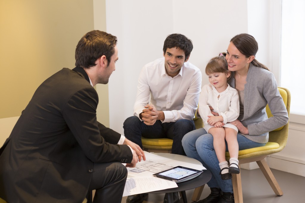 Loan lender talking to clients