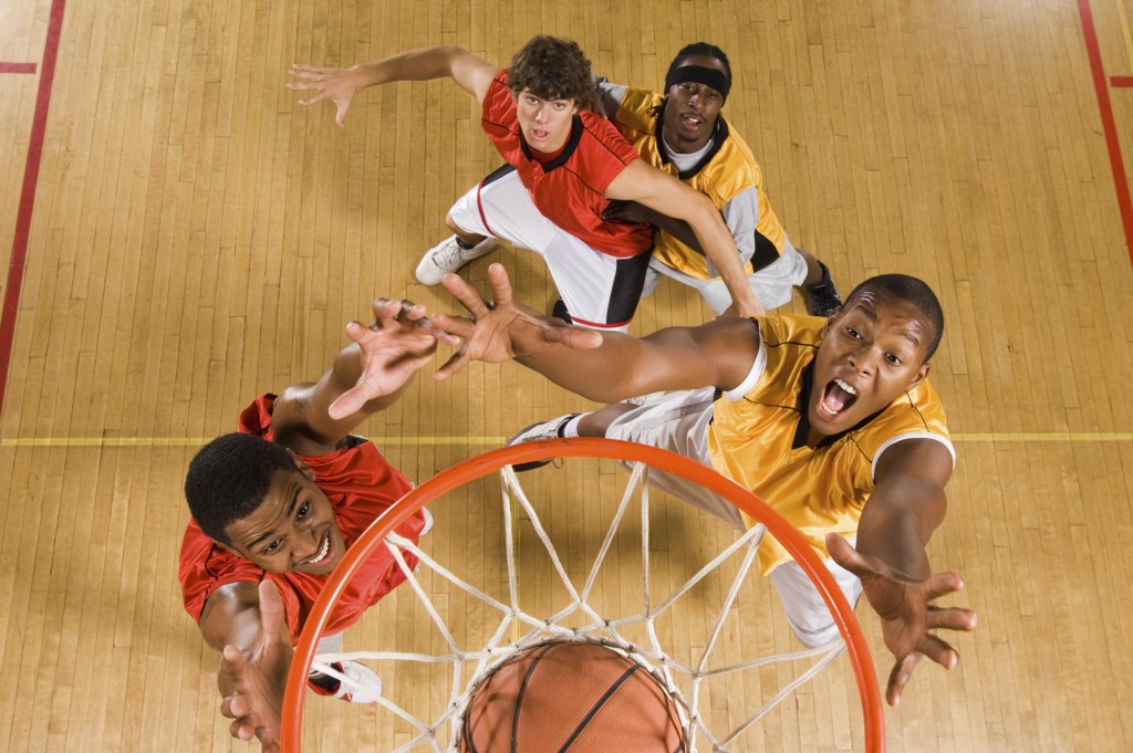basketball player dunking ball